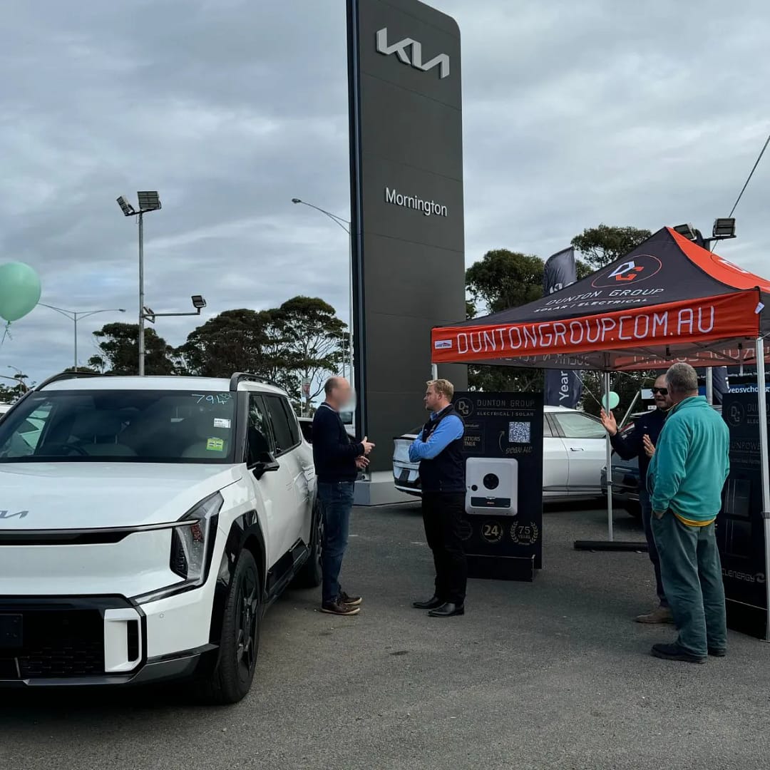 Tas and Sam Dunton with some attendees at Mornington Kia EV Experience