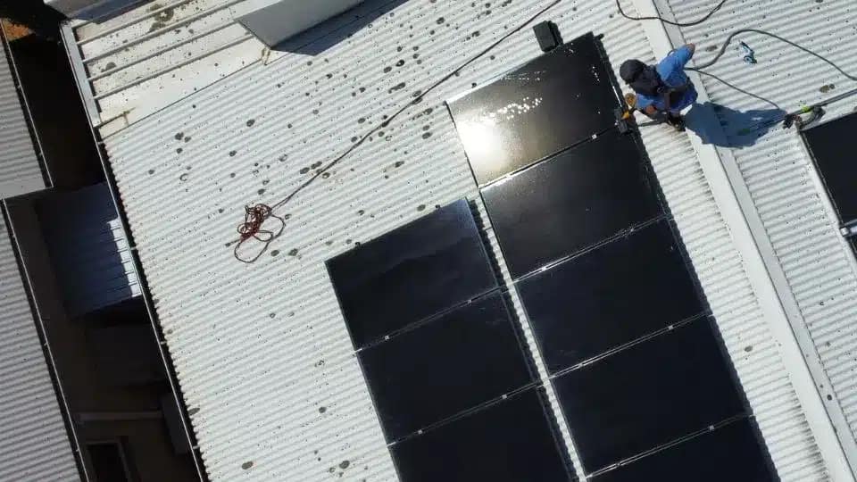 cleaning solar panel on the roof